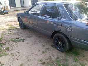 Mazda Familia BS98L 1990