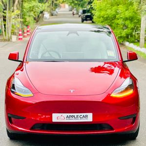 Tesla Model Y First Red With White 2024 - Image 2