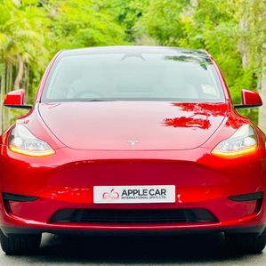 Tesla Model Y First Red With White 2024 - Image 3